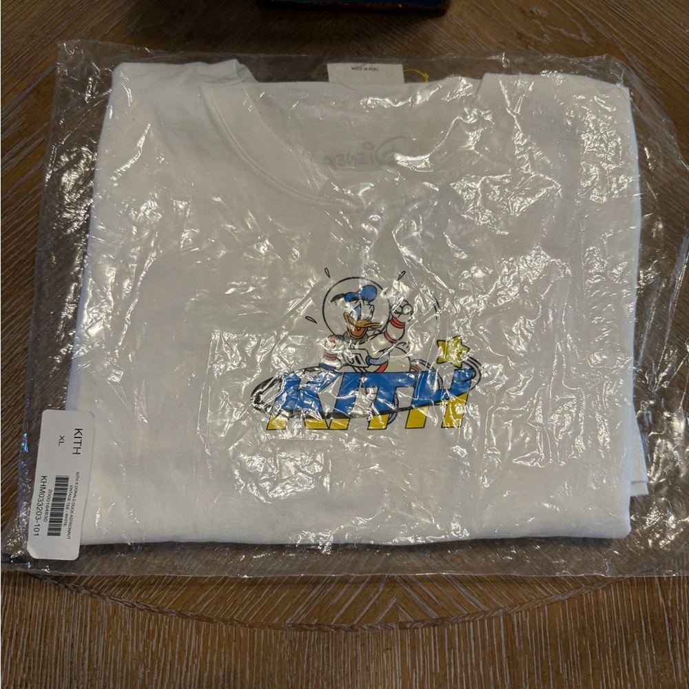 Kith X Donald Duck Astronaut Vintage Tee